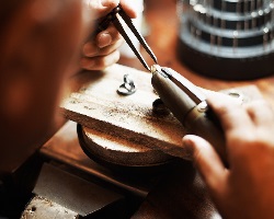 bench jeweler working on a ring