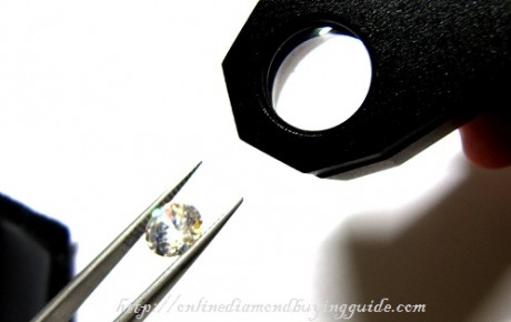 checking a diamond with a 10X loupe