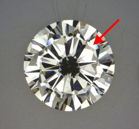slight fish eye showing up in shallow cut diamond